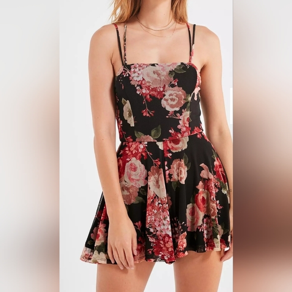 Urban Outfitters Pants - UO Urban Outfitters Black Floral Mini Knit Mesh Romper. Size XS.